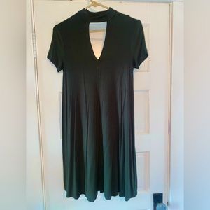 Soprano mid length dark green dress